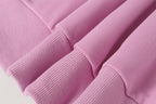 Stone Island hoodie cuffs and hem in light pink rib knit.