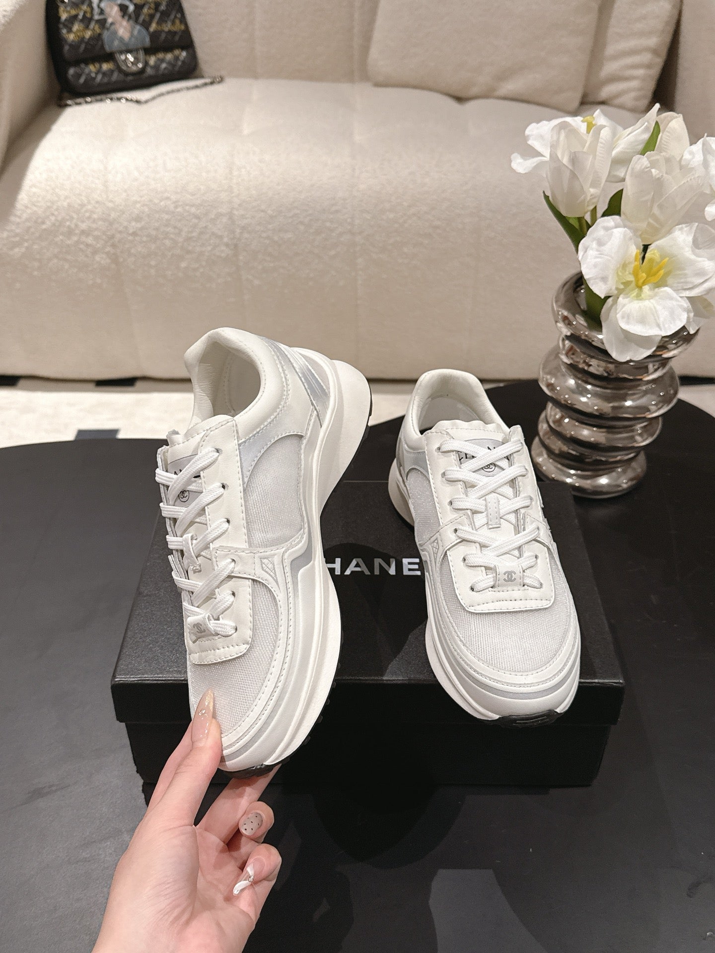 Chanel unisex white lace-up sneakers with side emblem and sculpted sole