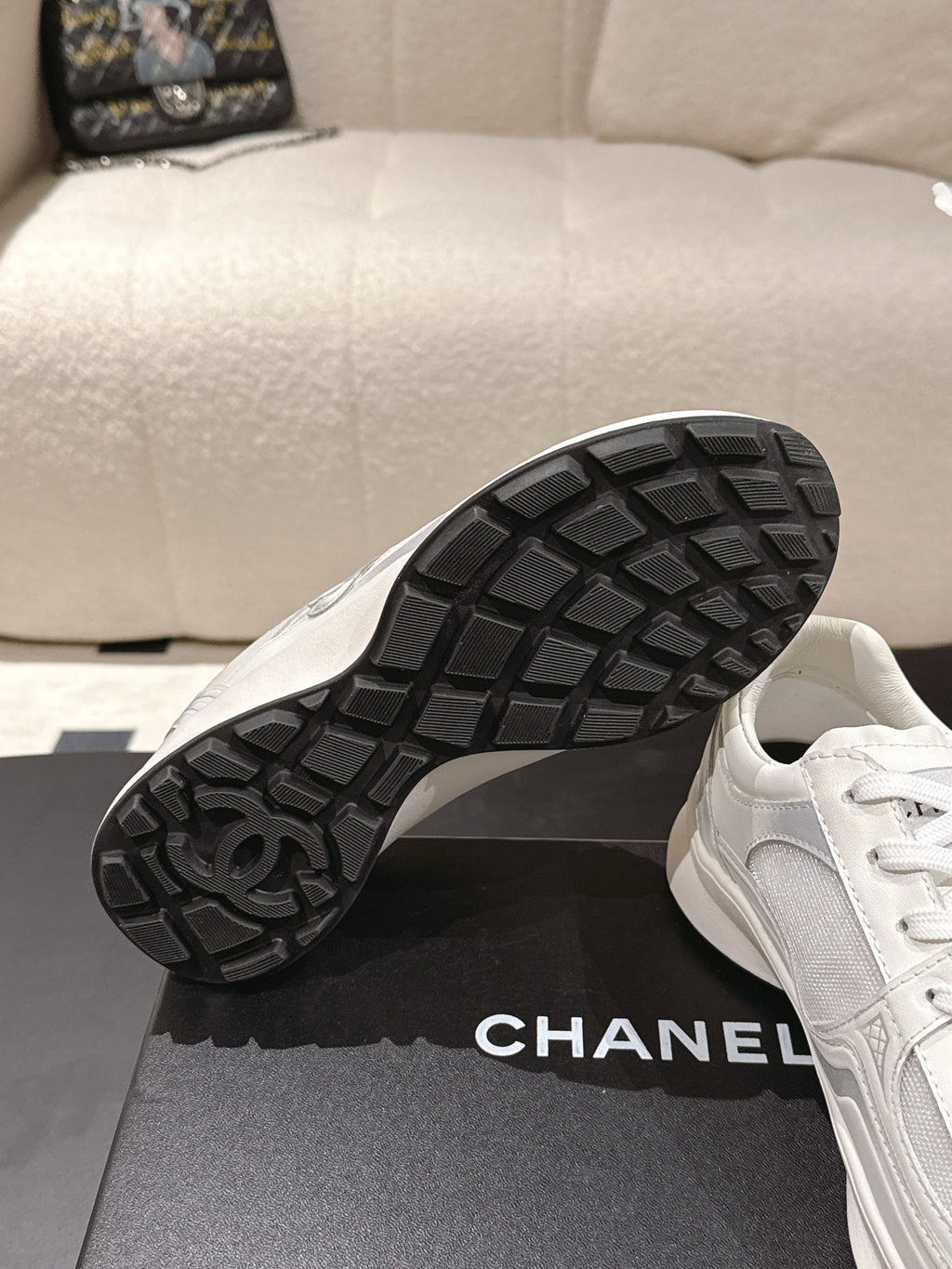 Chanel unisex white sneakers with black treaded rubber outsole