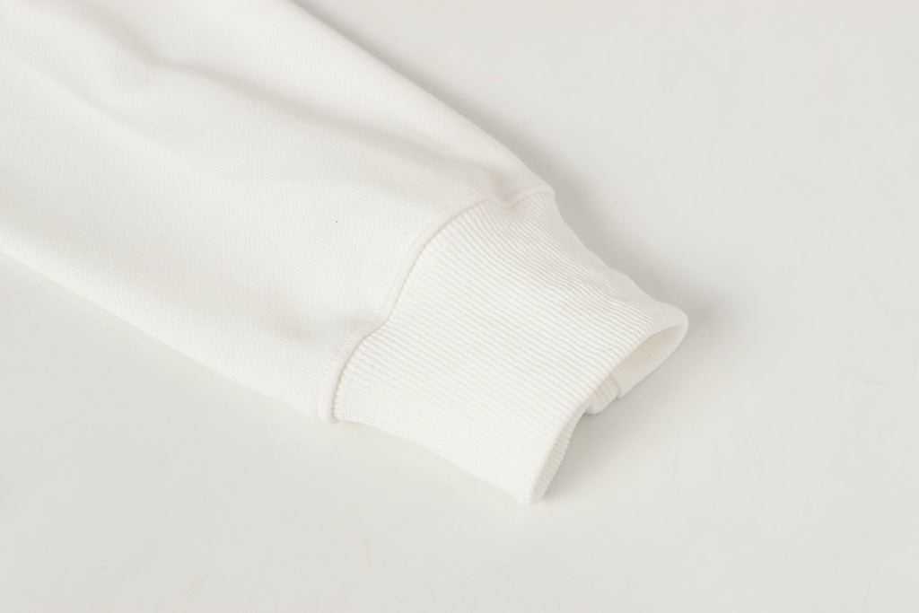 Stone Island white ribbed cuff with soft knit sleeve hem
