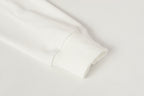Stone Island white ribbed cuff with soft knit sleeve hem