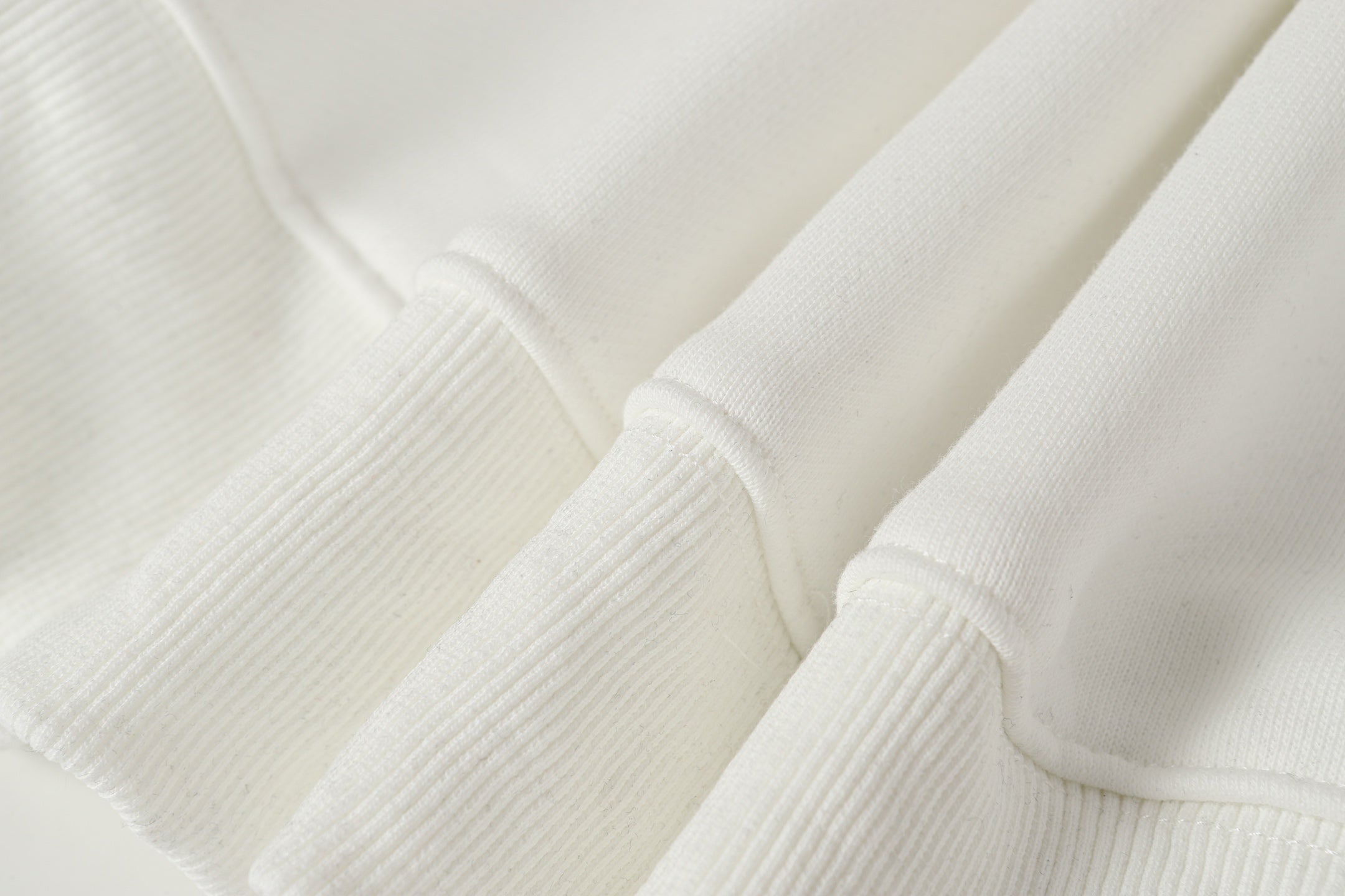Stone Island white ribbed cuffs and sleeve knit detail