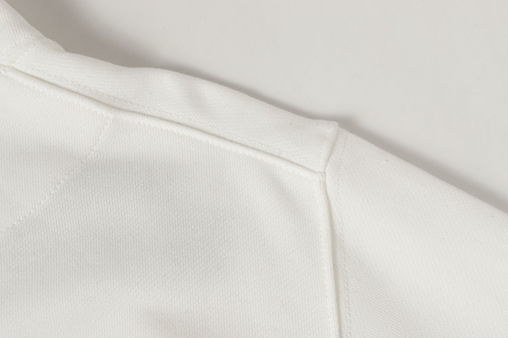 Stone Island white sweatshirt hem with clean side seam finish