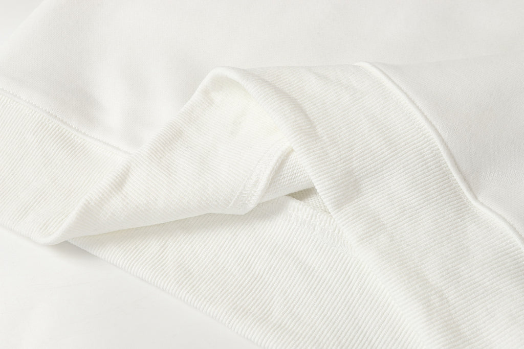 White zip-up hoodie fabric seam and cuff