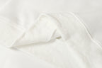 White zip-up hoodie fabric seam and cuff