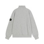 Light gray quarter-zip sweatshirt with black zipper on back