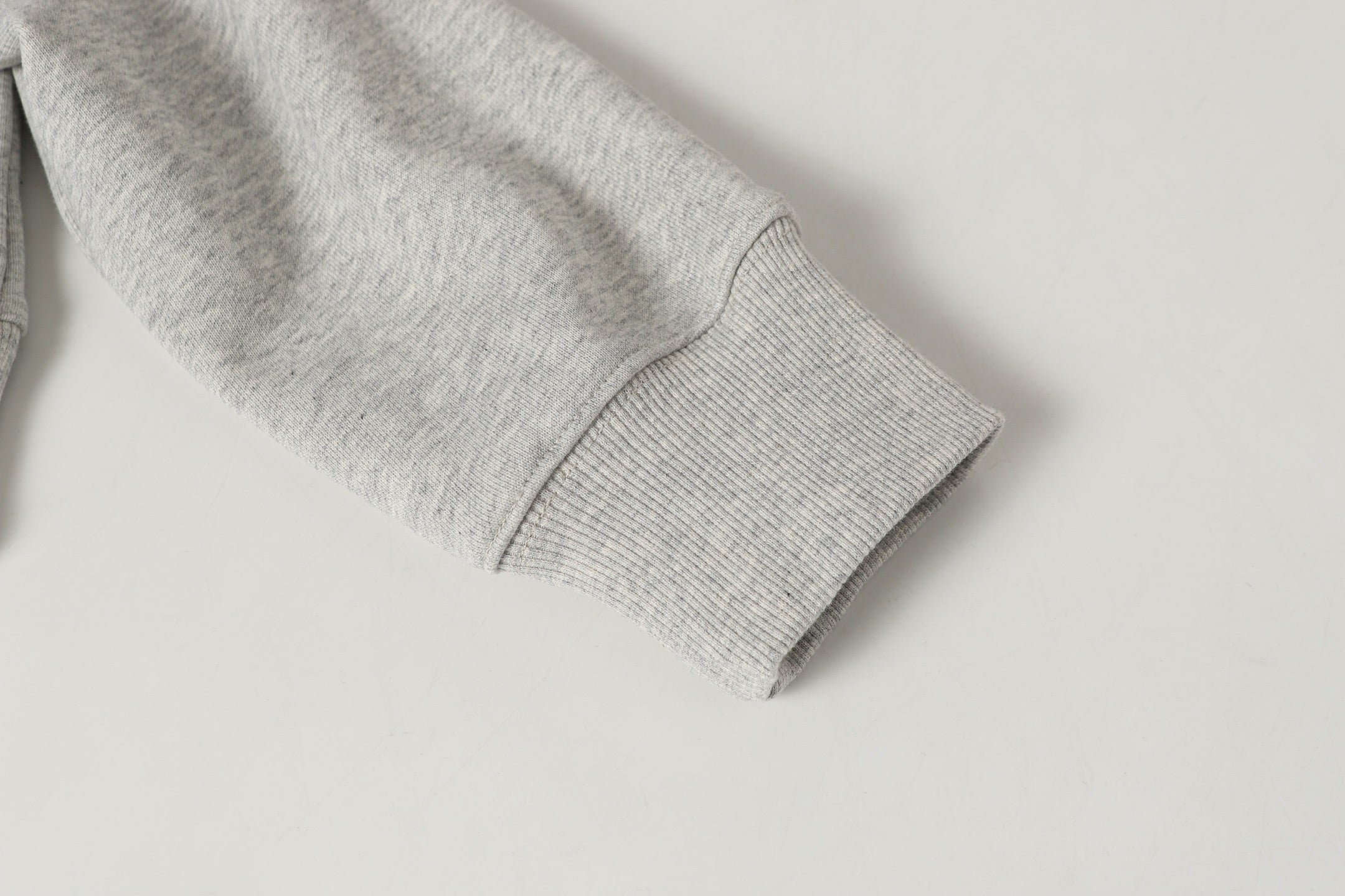 Stone Island crewneck sweatshirt sleeve cuff and ribbed hem in light gray