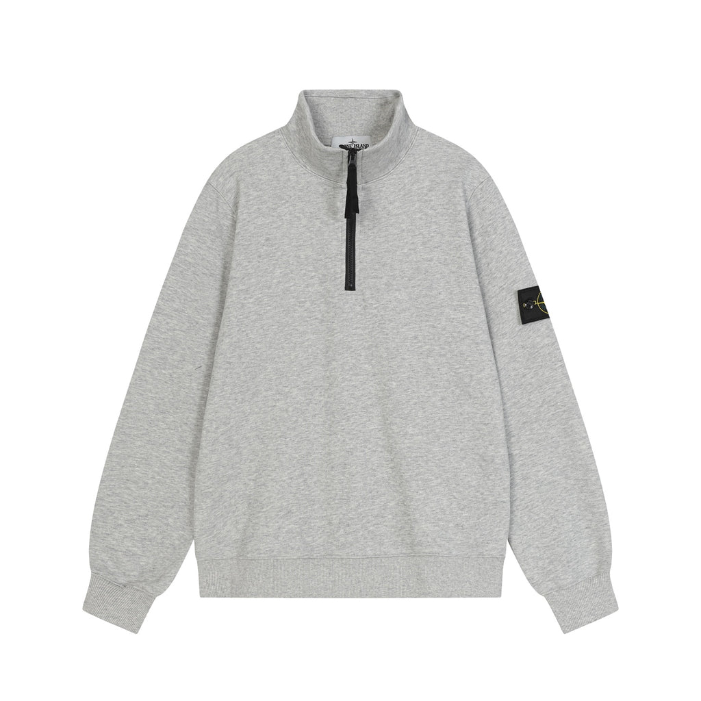 Light gray quarter-zip sweatshirt with black zipper and mock neck
