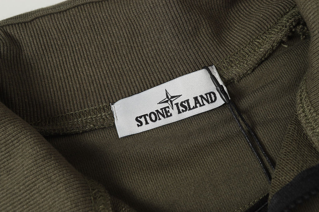 Stone Island quarter-zip sweatshirt with branded neck label inside collar