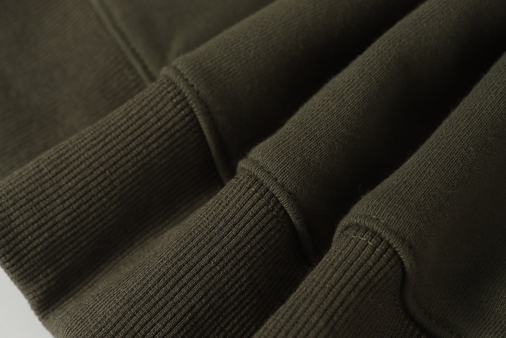 Stone Island quarter-zip sweatshirt ribbed sleeve cuff and knit texture detail