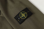 Stone Island quarter-zip sweatshirt with yellow logo patch on sleeve