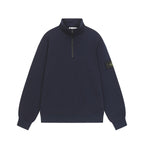 Stone Island quarter-zip sweatshirt in dark navy with stand collar and half zipper.