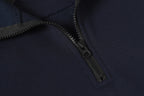 Navy quarter-zip sweatshirt with metal zipper and textured placket.