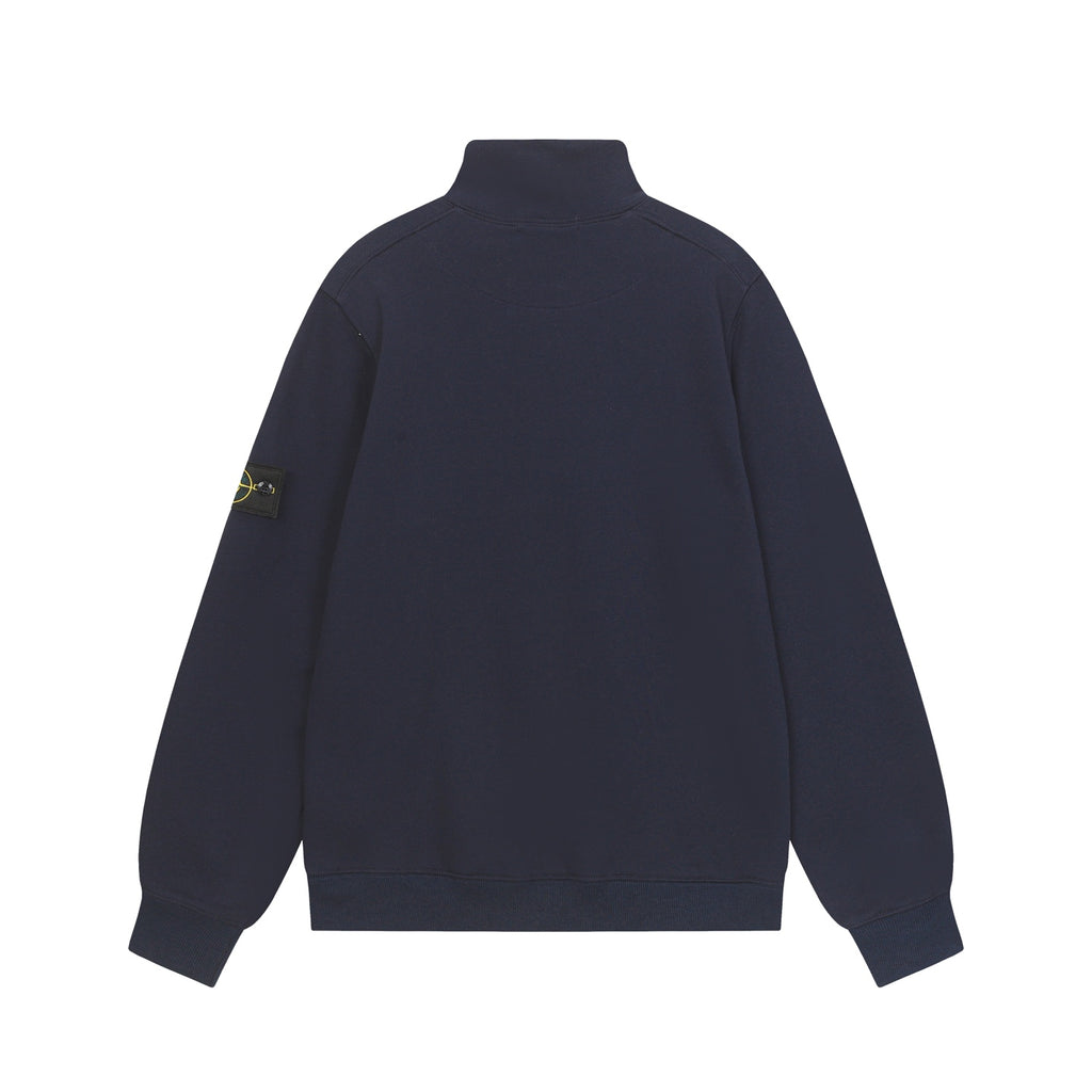 Dark navy quarter-zip sweatshirt with stand collar and logo patch on sleeve.