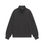 Black Stone Island half-zip sweatshirt with stand collar and sleeve logo patch