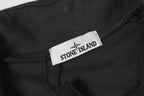 Stone Island dark trousers with logo label and waistband patch
