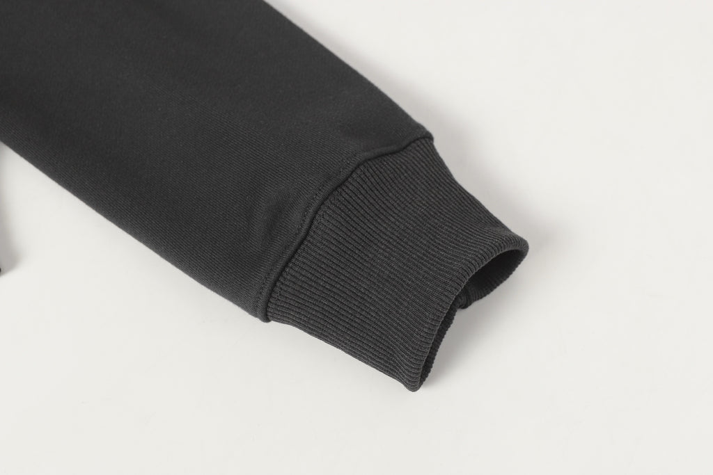 Stone Island dark trousers with ribbed ankle cuff