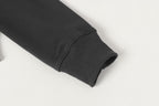 Stone Island dark trousers with ribbed ankle cuff