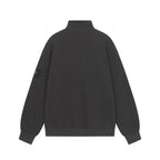 Black half-zip sweatshirt with stand collar and small sleeve logo patch, back view