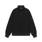 Black quarter-zip sweatshirt with ribbed collar, long sleeves, logo patch on arm