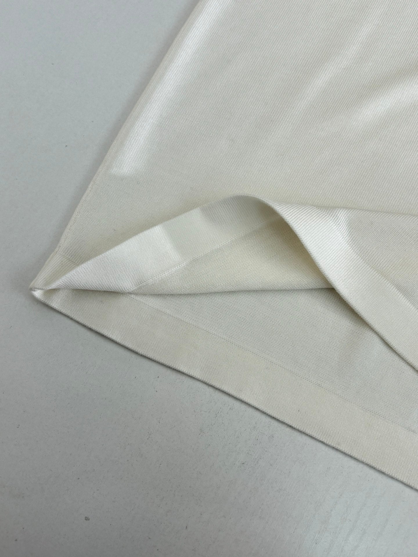 Louis Vuitton white T-shirt sleeve and hem detail laid flat