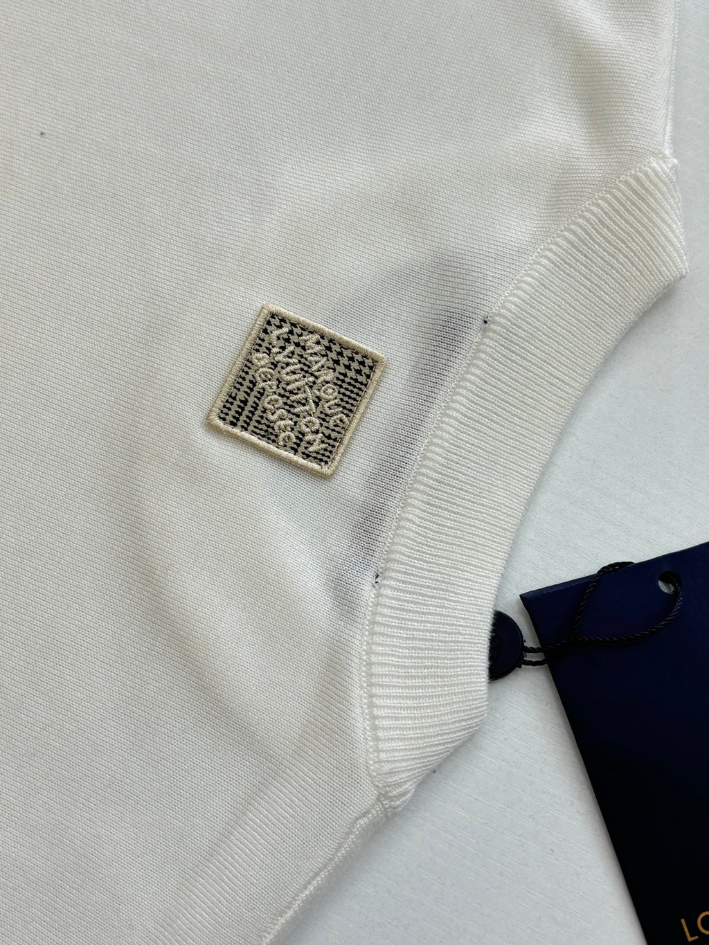 Louis Vuitton white T-shirt side hem with small square label