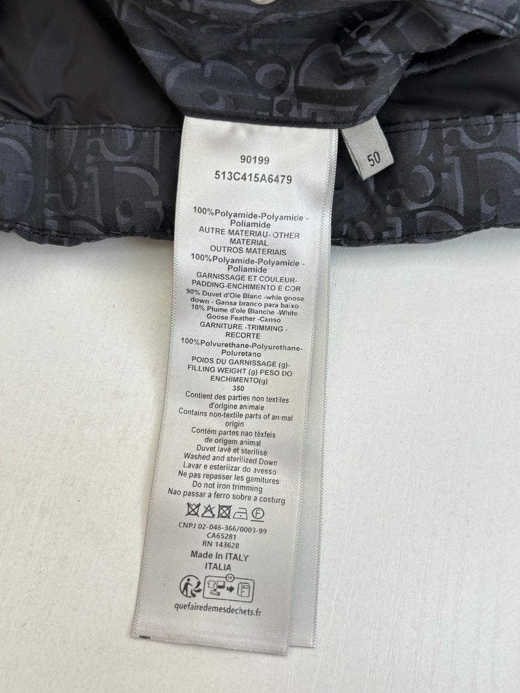 Dior long clothing garment care label tag with size and material details