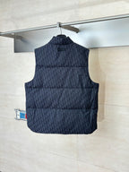 Quilted sleeveless vest with stand collar, dark Dior monogram pattern, patch pockets.