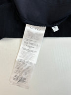 Gucci long clothing interior with size tag and care label
