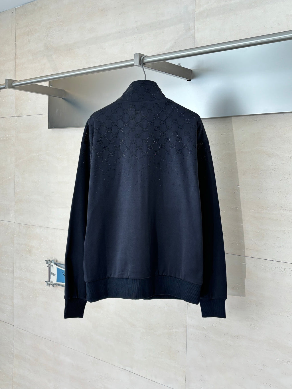 Gucci long-sleeve zip jacket, dark navy back view, ribbed hem and cuffs