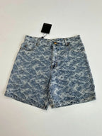 Blue monogram denim shorts on hanger with front zip fly and belt loops