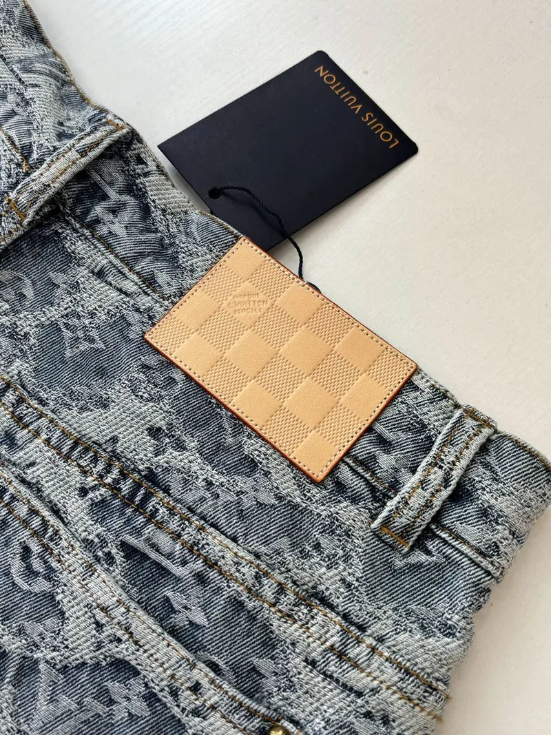 Blue monogram denim shorts close-up with tan check leather card holder