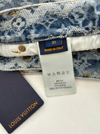 Denim shorts inner tag showing size 31, Made in Italy and care symbols