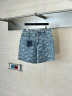 Blue monogram denim shorts with button closure and side pockets