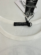 White crewneck shirt collar with black neck label and drawstring tag