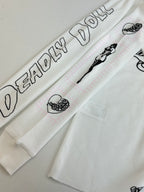 White sleeve cuff with black text and small icon prints