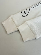 White waffle-knit shorts with elastic waistband
