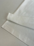 White polo shirt sleeve hem and cuff detail