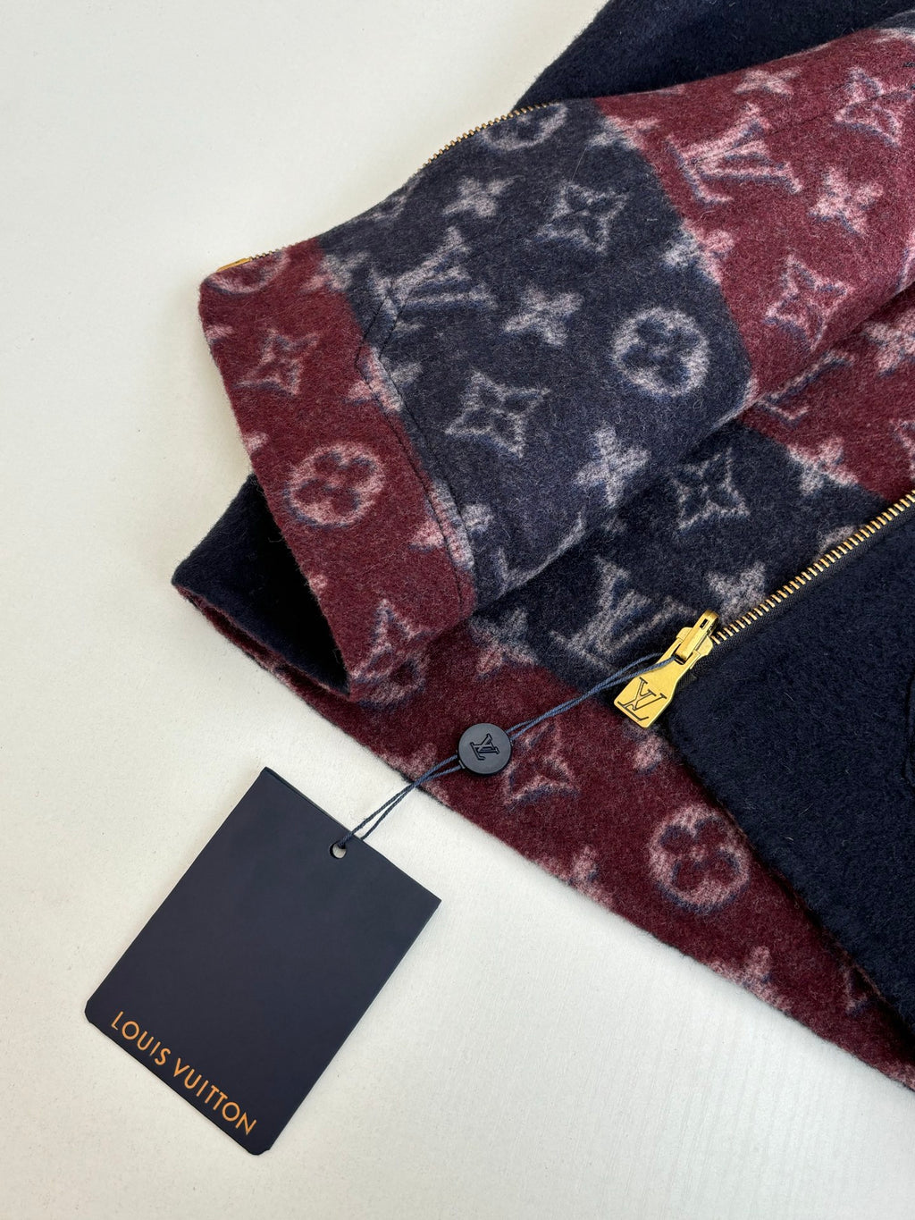 Monogram zip accessory in burgundy and navy knit, Louis Vuitton
