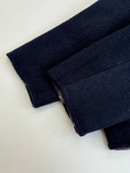 Dark navy long pants with textured knit fabric and folded cuff, Louis Vuitton