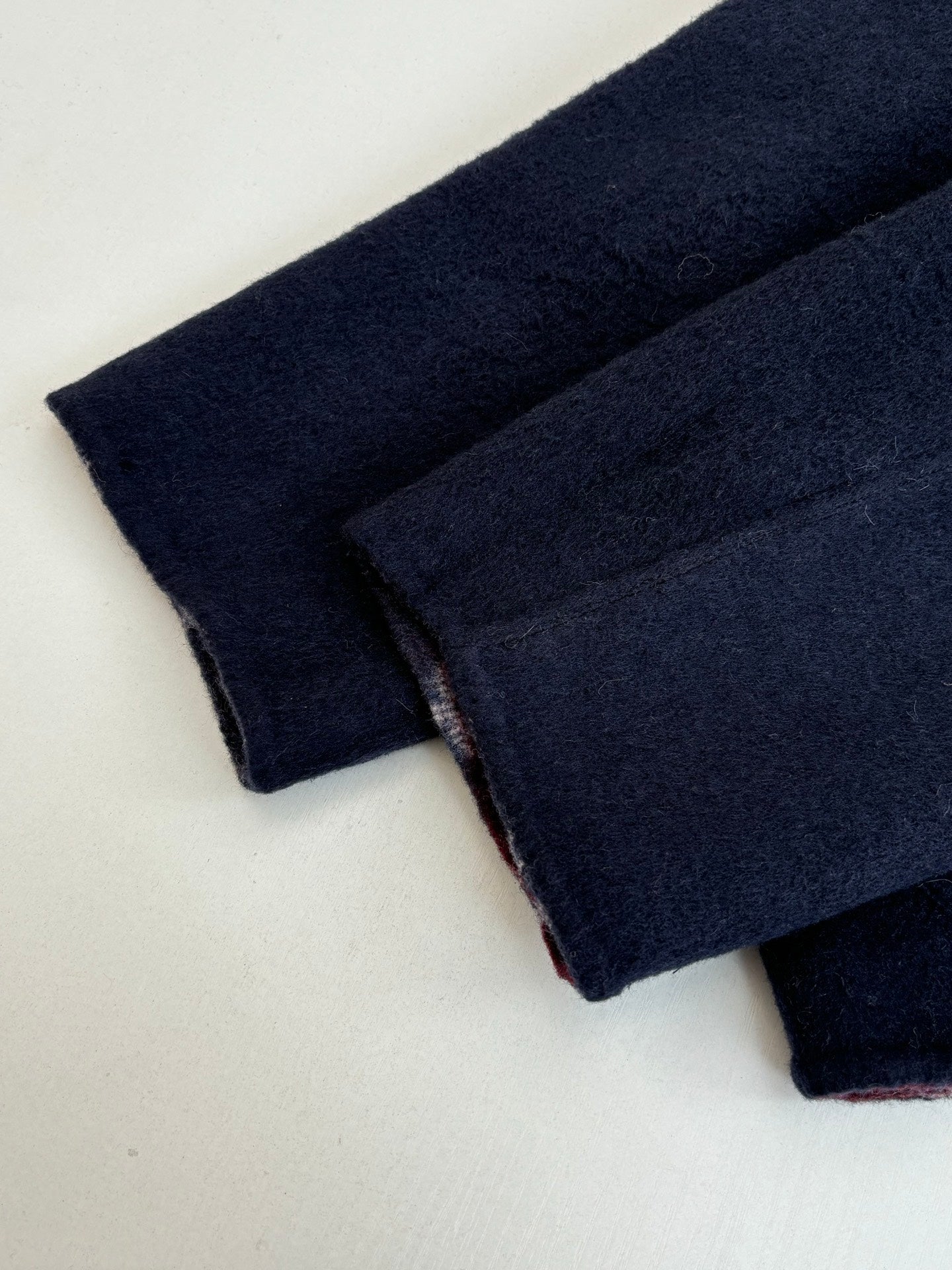 Dark navy long pants with textured knit fabric and folded cuff, Louis Vuitton