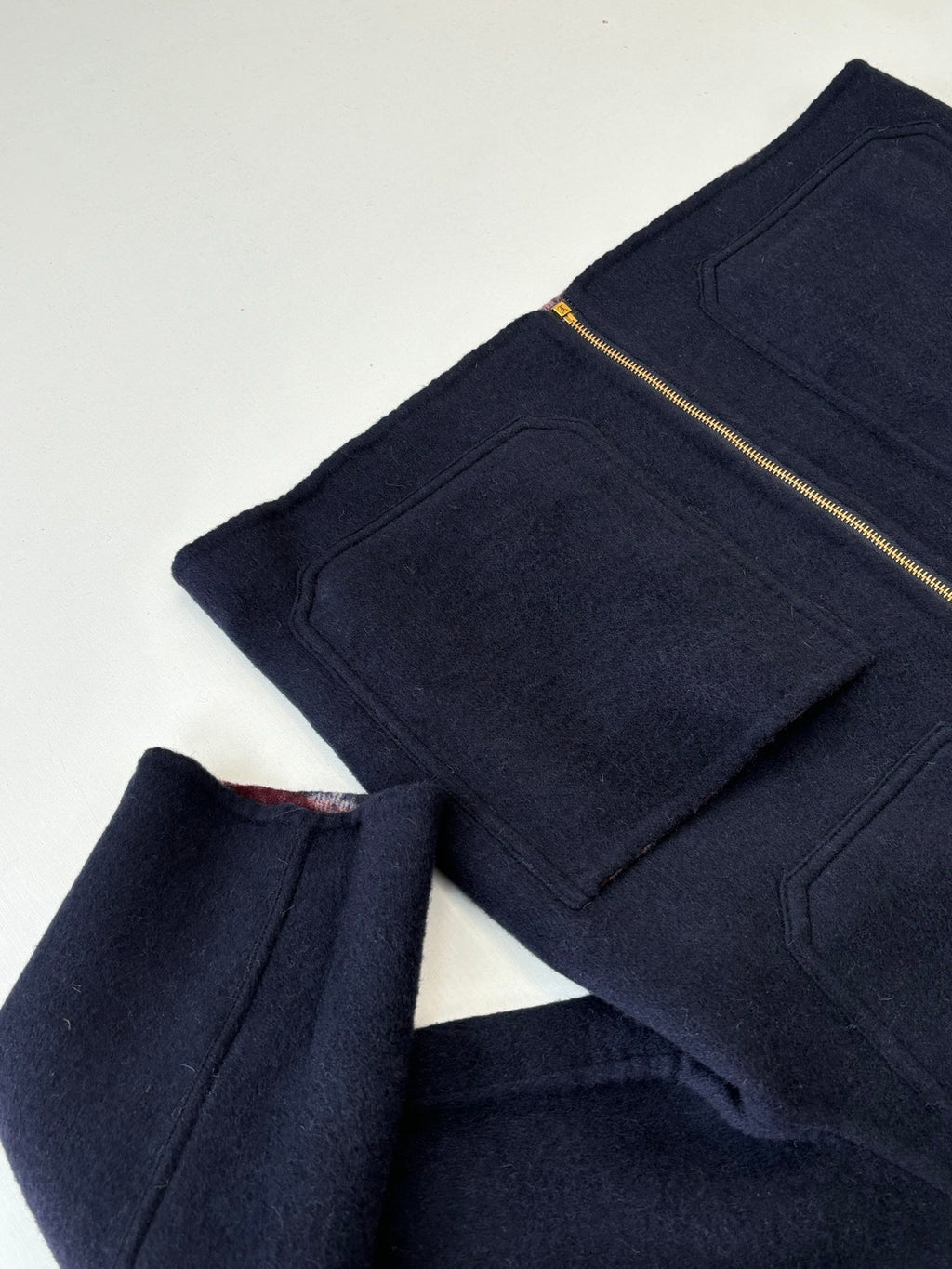 Navy long pants with front flap pockets and gold-tone zip detail, Louis Vuitton