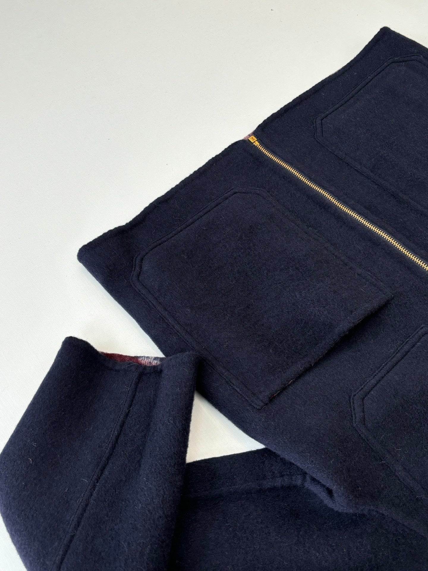 Navy long pants with front flap pockets and gold-tone zip detail, Louis Vuitton