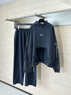 Navy Balenciaga hoodie and matching joggers set on hanger