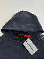 Navy Balenciaga hoodie hood with drawstring and red brand tag