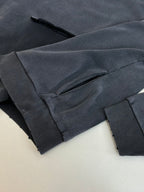 Navy Balenciaga joggers with elastic cuff hem and side pocket seam