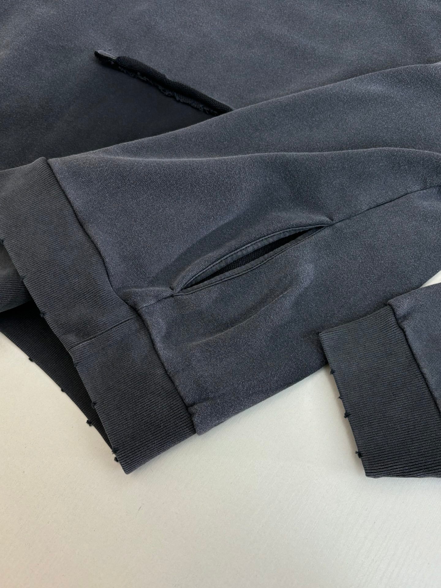 Navy Balenciaga joggers with elastic cuff hem and side pocket seam