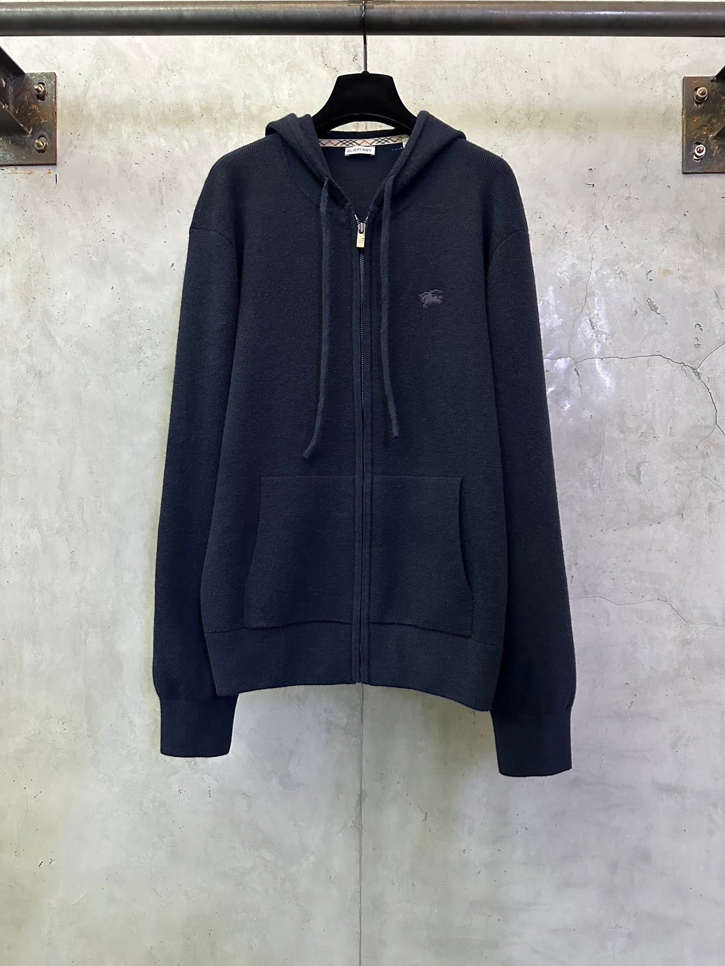 Men's Burberry navy zip-up hoodie with hood, drawstrings, and front pockets