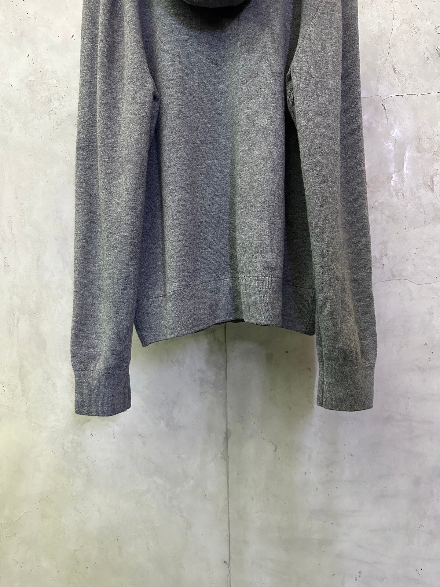 Burberry long zip hoodie in heather gray, back view showing long sleeves and hem