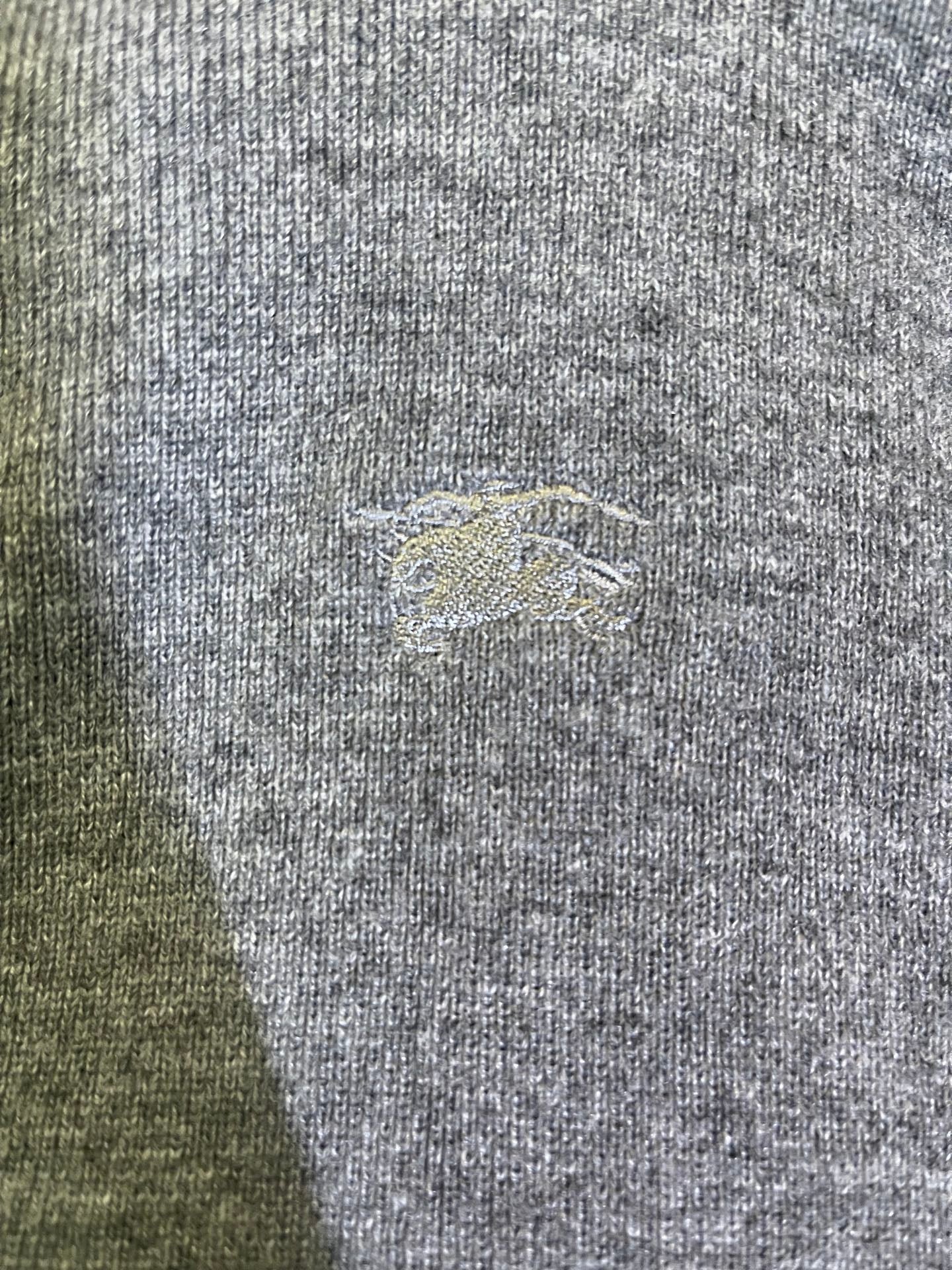 Heather gray knit fabric with small embroidered logo on Burberry long zip hoodie